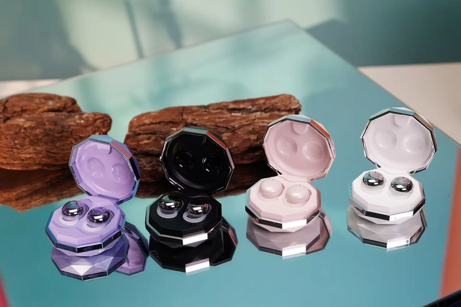 Low-profile sleep earbuds shown in four color options